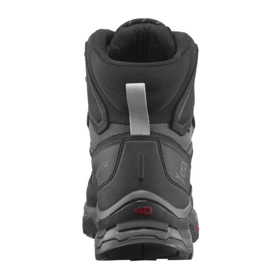 botte de randonnée Salomon Quest 4 gtx pour homme couleur black vu de l'arrière de la botte avec sangle de tirage