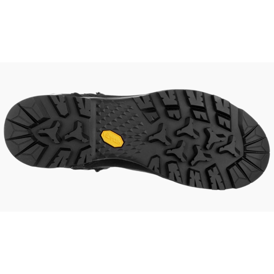 botte de randonnée salewa trainer 2 mid gtx pour homme couleur onyx/black vue de la semelle d'usure Vibram noire avec le logo vibram jaune intégré à la semelle