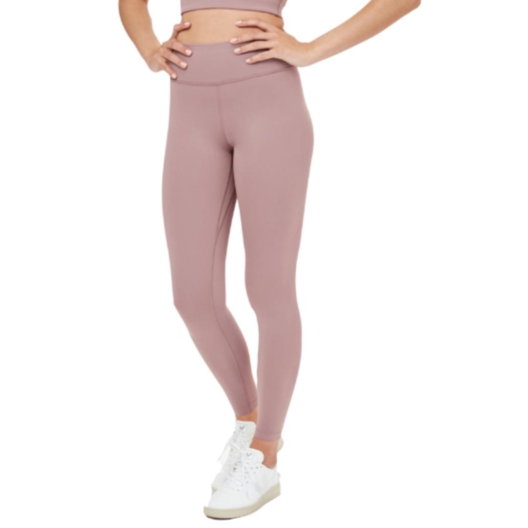 LEGGING LONG TENTREE INMOTION HIGH RISE POUR FEMME COULEUR TWILIGHT MAUVE PORTÉ PAR UNE FEMME VUE DE FACE DE LA TAILLE AU PIEDS