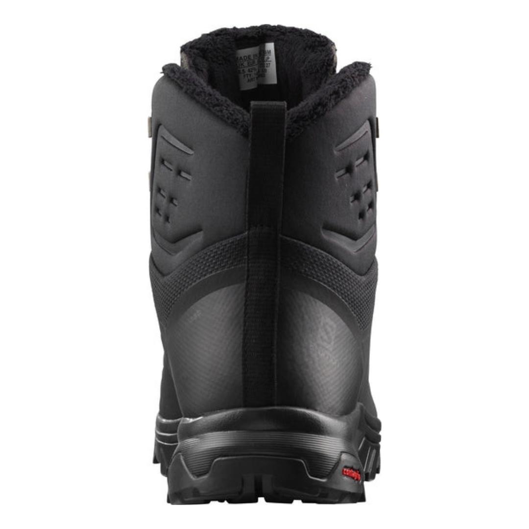 BOTTTE D'HIVER SALOMON OUTBLAST TS CSWP POUR HOMME COULEUR BLACK/BLACK/BLACK VUE DE L'ARRIÈRE DE LA BOTTE AVEC LANGUETTE DE TIRAGE POUR L'ENFILER