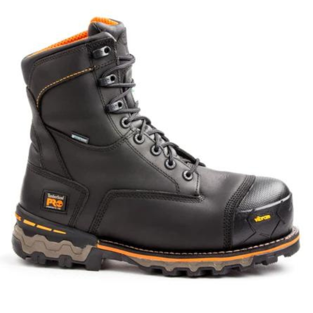 BOTTE DE SÉCURITÉ IMPERMÉABLE ET ISOLÉE TIMBERLAND PRO BOONDOCK 8" 200G POUR HOMME COULEUR BLACK VUE DE PROFIL DROIT DE LA BOTTE DROITE LOGO TIMBERLAND PRO AU TALON ET LOGO VIBRAM SUR L'EMBOUT PROTECTEUR À LA POINTE