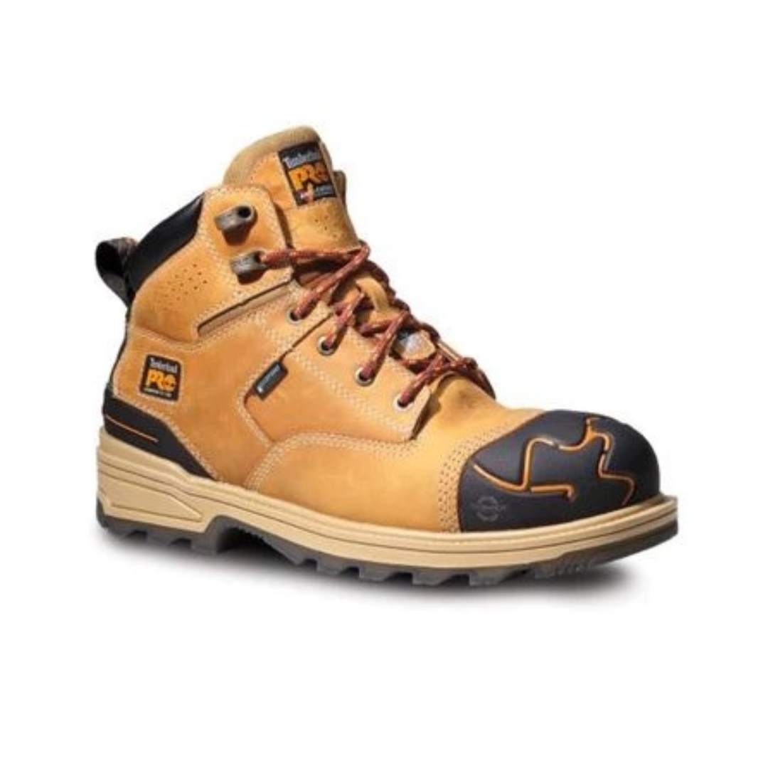 BOTTE DE SÉCURITÉ TIMBERLAND PRO MAGNITUDE " IMPERMÉABLE CSA SANS MÉTAL POUR HOMME COULEUR WHEAT VUE DE PROFIL DROIT DE LA BOTTE DROITE EMBOUT PROTECTEUR NOIR AVEC ÉCLAIRS ORANGES ÉCUSSON TIMBERLAND PRO ET WATERPROOF VISIBLES