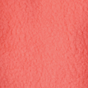 Gros plan d'un tissu rose texturé, présentant une surface douce et duveteuse. Le tissu présente un motif légèrement irrégulier, ce qui lui donne un aspect pelucheux.