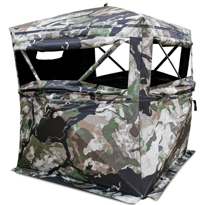 Cache de chasse portable à motif de camouflage avec fenêtres en filet et toit incliné, conçu pour la dissimulation en extérieur.