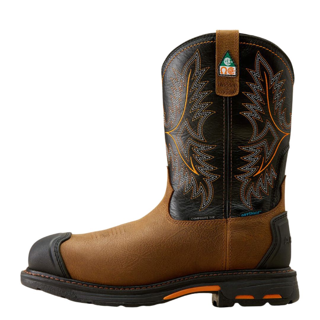 La WORKHOG XTR CSA W-SQUARE WP CP MED est une botte de travail à bout composite marron et noir avec des coutures décoratives, des tirettes, un bout renforcé, une semelle antidérapante, des accents orange et bleus et un talon surélevé.