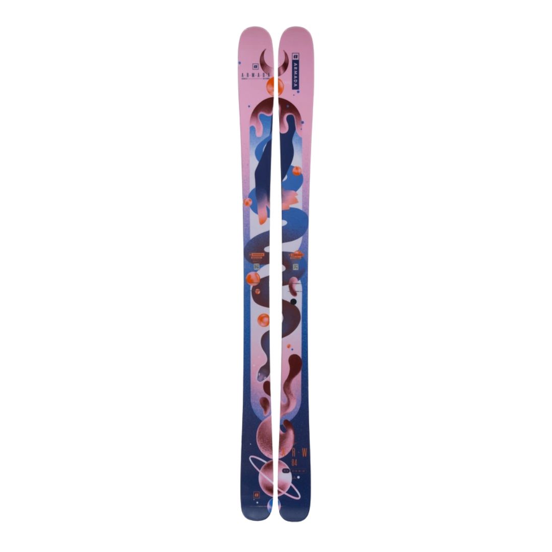 Une paire de skis au design coloré et abstrait avec différentes nuances de rose, de bleu et de violet. Les graphismes incluent des formes et des motifs artistiques, donnant aux skis un look moderne et dynamique.