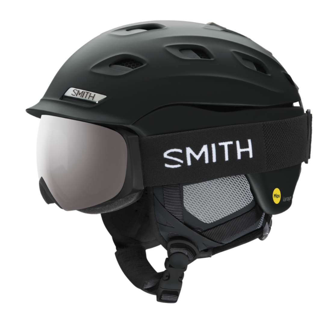 CASQUE DE SKI ALPIN SMITH VANTAGE MIPS POUR FEMME COULEU MATTE BLACK VU DU CASQUE NOIR MAT AVEC DES LUNETTES DE SKI DE PROFIL GAUCHE