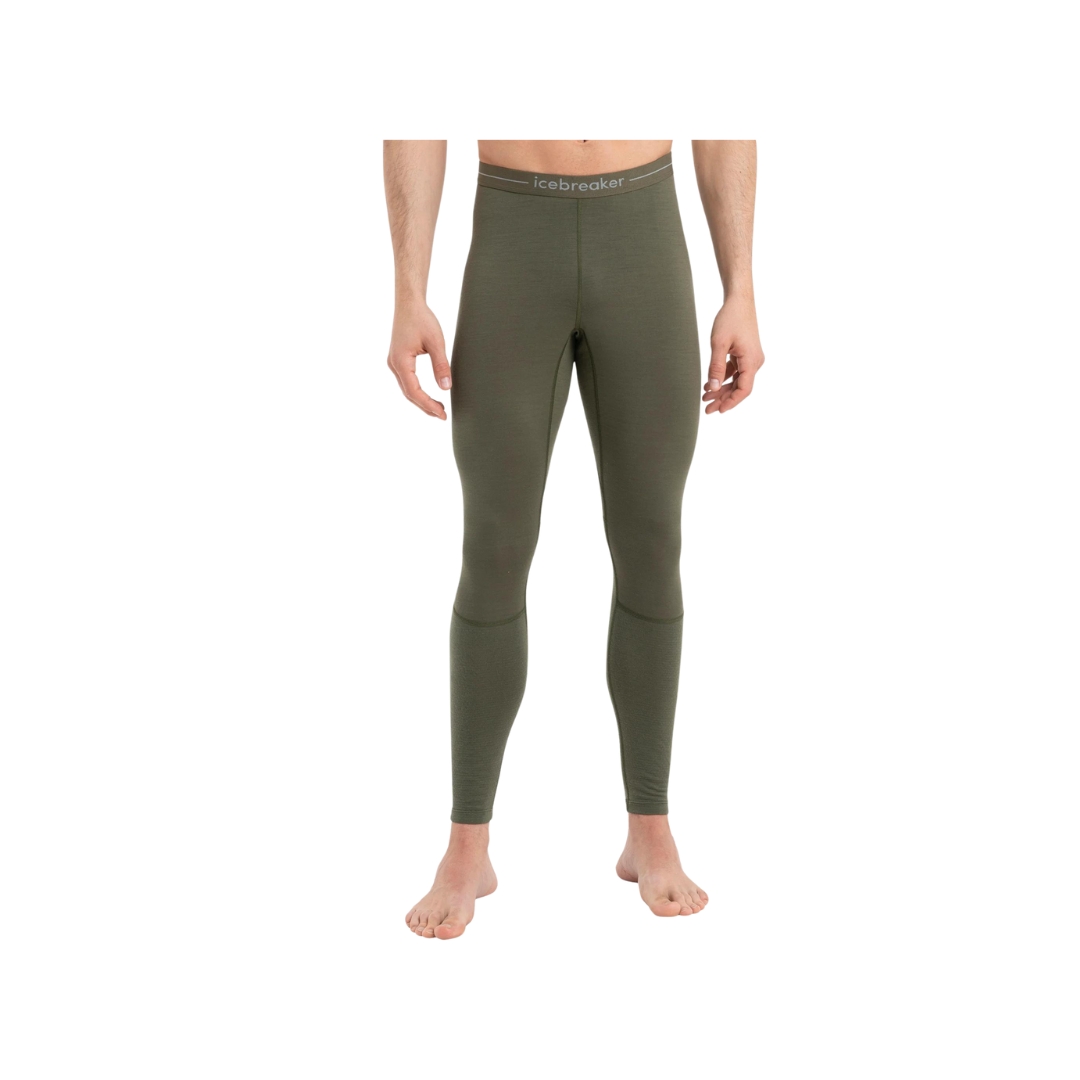 COUCHE DE BASE LEGGING ICEBREAKER LEGGING 200 ZONEKNIT™ EN MÉRINOS POUR HOMME de Couleur Loden porter par un homme vue du bas vert foncé des hanches aux chevilles de face