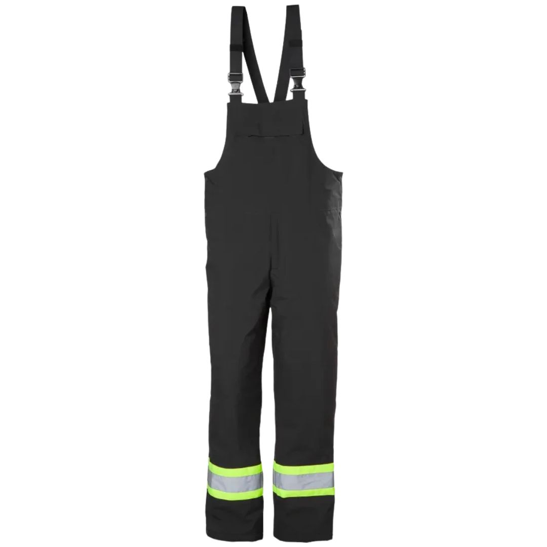 Salopette d'hiver isolante noire HELLY HANSEN WORKWEAR ALTA WINTER CSA, dotée de bretelles réglables et de bandes réfléchissantes haute visibilité autour du bas des jambes.