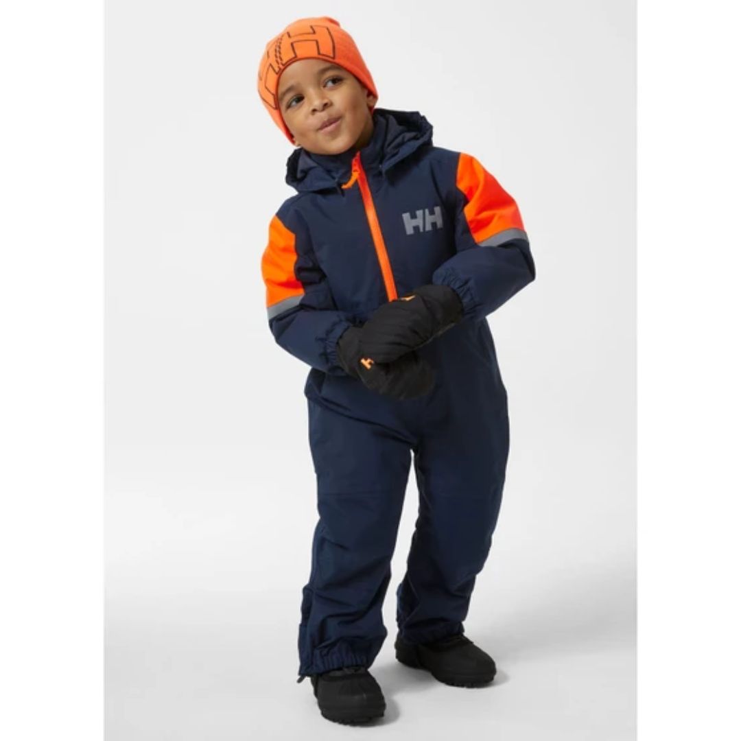 combinaison de neige rider 2.0 bleu et orange sur les épaules portée par jeune homme