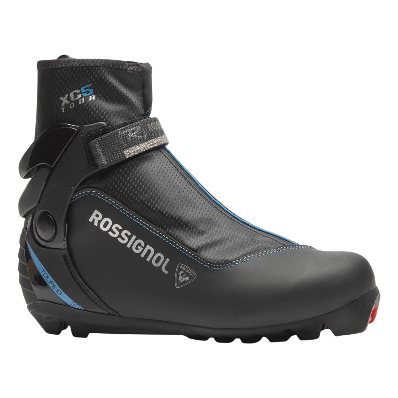 La BOTTE DE SKI ROSSIGNOL XC 5 FW POUR FEMME est une chaussure de ski de fond noire pour femme avec des accents bleus, une bride de cheville, une semelle robuste et le logo Rossignol sur le côté - idéale pour les sports d'hiver en plein air.