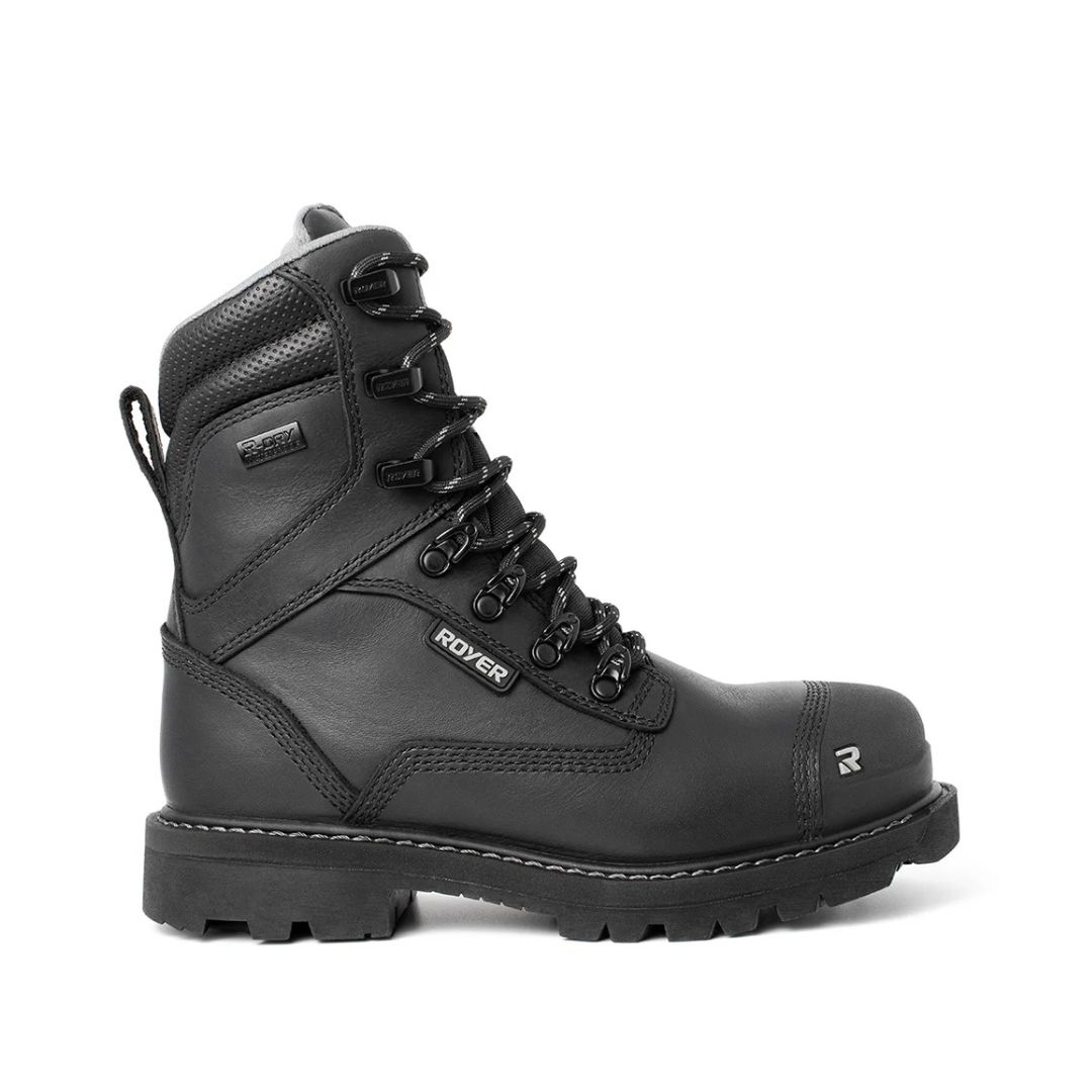 Une botte de travail noire à tige haute avec une semelle robuste, des œillets métalliques, des lacets épais et un bout renforcé. La botte porte l'étiquette de la marque "ROVER" et dispose d'une boucle de traction au talon.