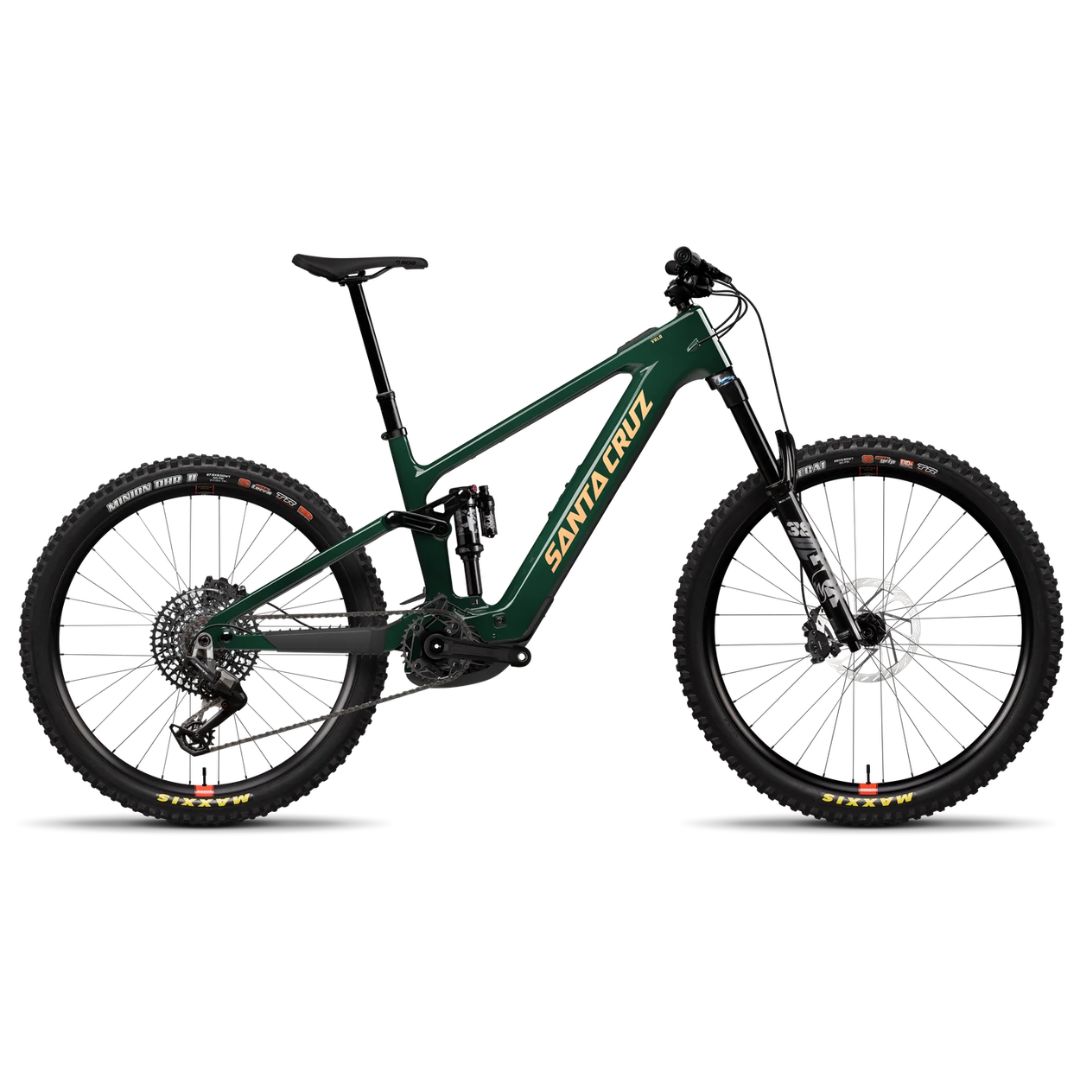 Un VTT tout suspendu VALA 1 C MX 26 LG GRN 90 US, de couleur vert foncé avec des inscriptions jaunes, équipé de pneus à crampons et doté d'un cadre aux lignes épurées, photographié de profil sur fond blanc.