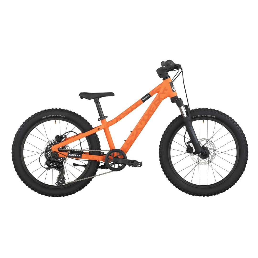 Le ROXTER 200 est un VTT pour enfants de couleur orange vif avec un guidon, une selle et des pneus noirs. Il est équipé d'une fourche à suspension avant et de freins à disque. Il est représenté de profil sur fond blanc.