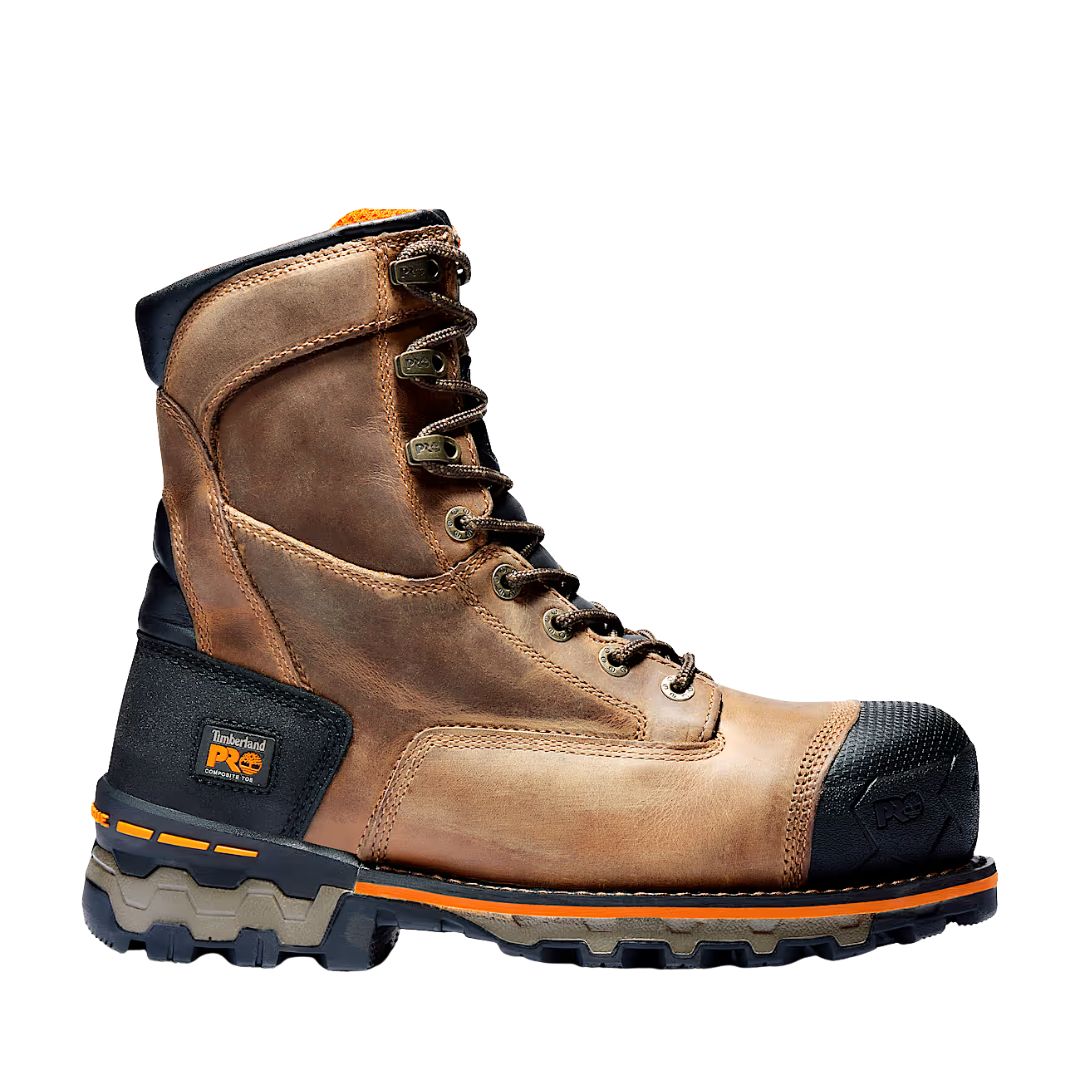 La 8 IN BOONDOCK CT FP CSA est une botte de travail robuste en cuir marron avec des accents noirs et orange, un bout renforcé, une semelle résistante, des œillets métalliques et le logo "Timberland PRO" sur le côté, conçu pour la durabilité et la protection.