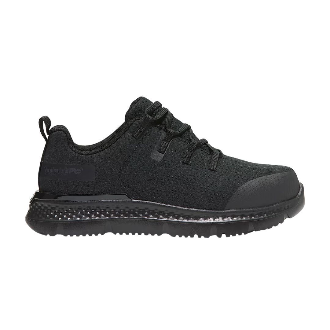 Une chaussure de sport basse noire avec une semelle texturée, une fermeture à lacets et un logo Timberland PRO subtil sur le côté.