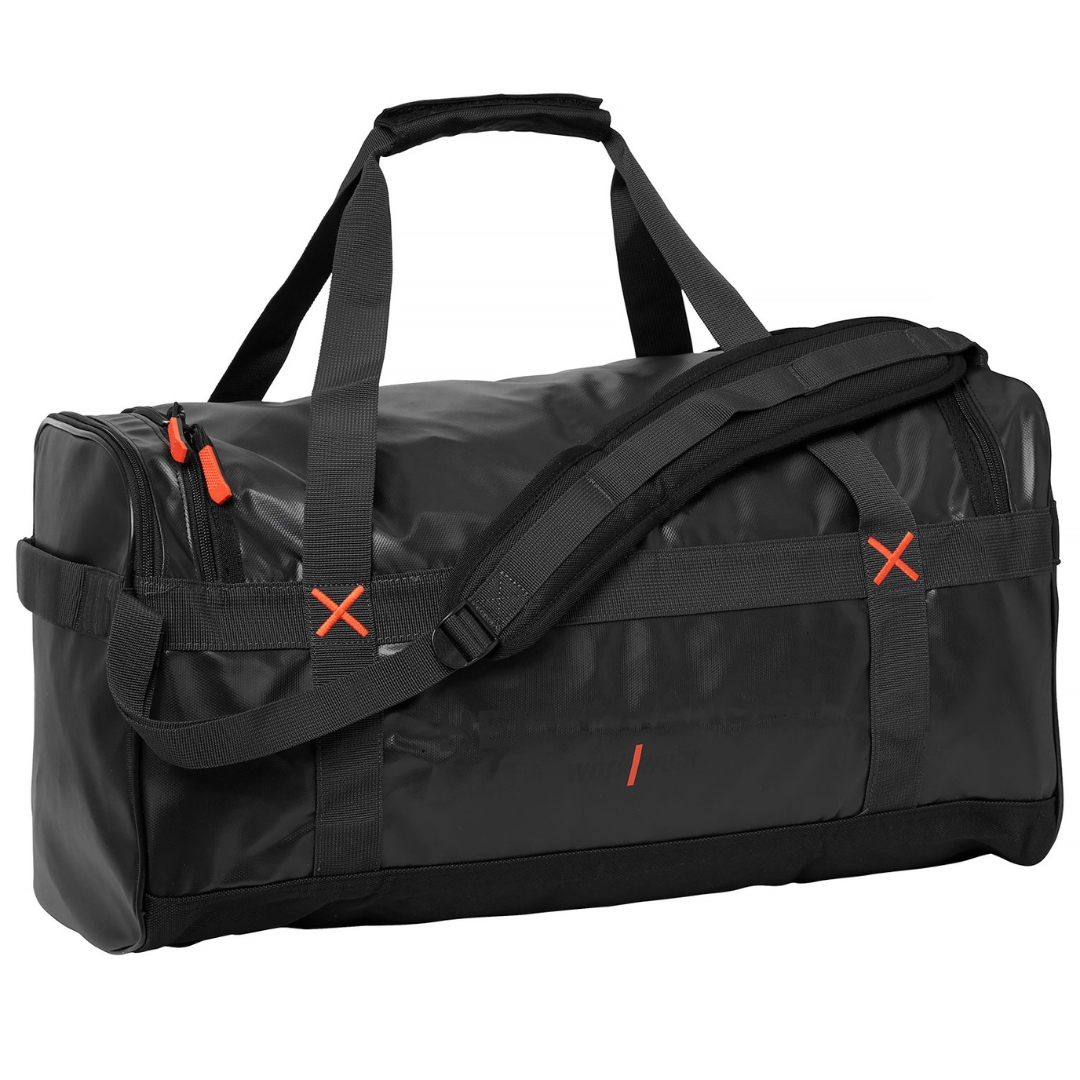 SAC DE TRANSPORT HELLY HANSEN WORKWEAR 50L couleur black vu de face helly hansen workwear imprimé en noir lustré au devant, coutures contrastantes orangées, poignées de transport visibles au dessus ainsi que la sangle de transport