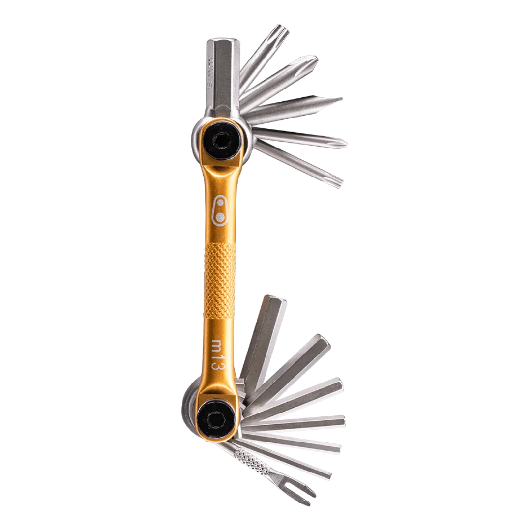 MULTI OUTIL CRANKBROTHERS M13 couleur gold vue des clés du multitool de profil, clés couleur acier métallique et côté doré métallique