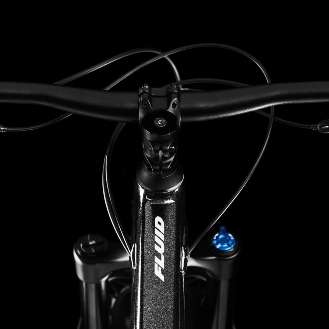 VÉLO DE MONTAGNE NORCO FLUID HT 1 couleur black silver vue vue du guidon et tête d'ammortisseurs