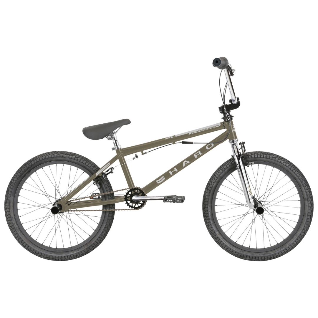 VÉLO BMX POUR ENFANT HARO BIKES SHREDDER PRO 20 DLX COULEUR GRANITE VUE DU PROFIL DROIT DU VÉLO BRUN MÉTALLIQUE LETTRÉ BLANC