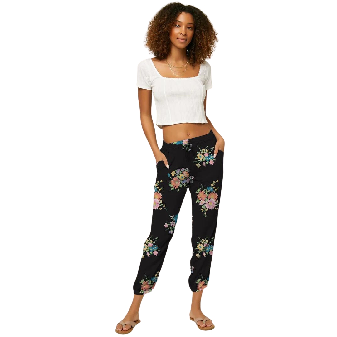 PANTALON LONG O'NEIL JIGGY POUR FEMME couleur black vu du pantalon noir à imprimé floraux de face