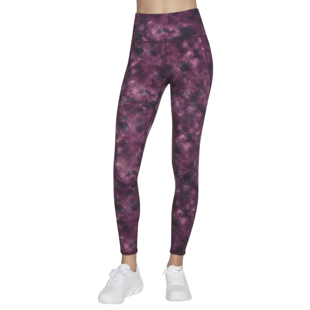 LEGGING LONG SKECHERS GO FLEX HAZE POUR FEMME couleur bordeaux vu du leggins mauve raisin, rose et mauve foncé porté par une femme vue de la taille aux pieds de face