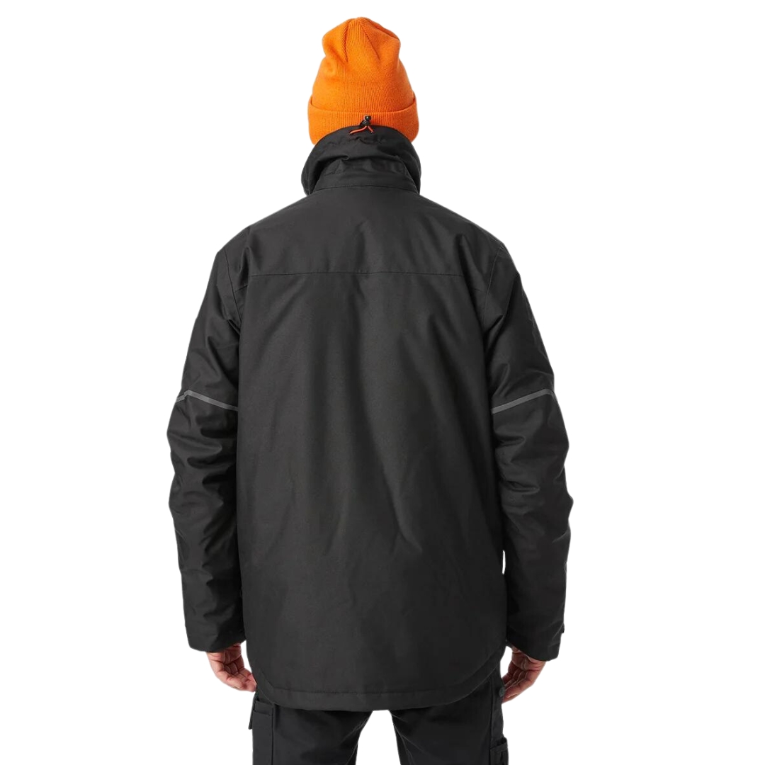 MANTEAU DE TRAVAIL ISOLÉ HELLY HANSEN WORKWEAR KENSINGTON POUR HOMME couleur black vu du manteau noir avec détails orange fluo porté par un homme vu de dos