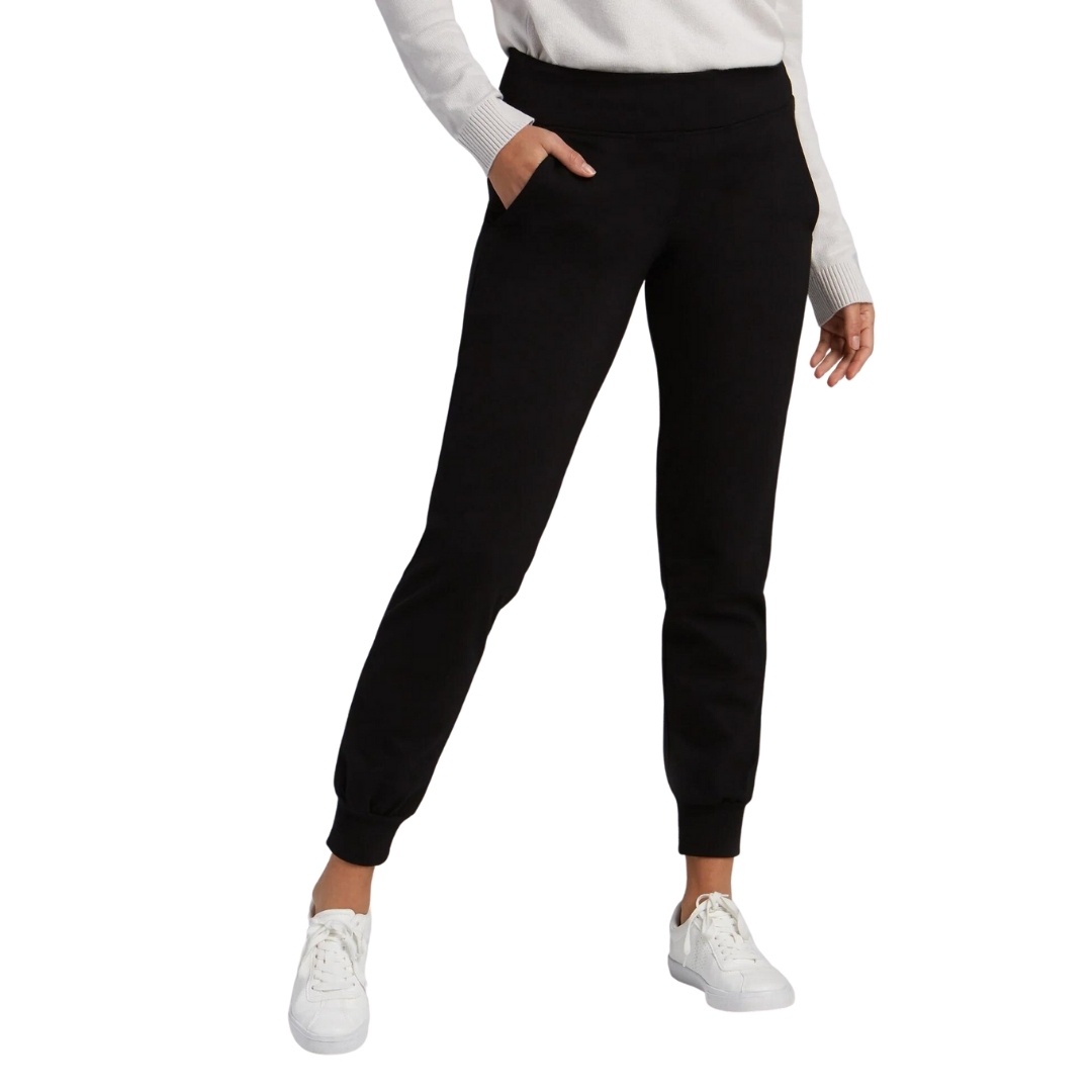 PANTALON LONG FIG OTH 2.0 POUR FEMME couleur black vu du pantalon noir porté par une femme vue de la taille aux pieds de face