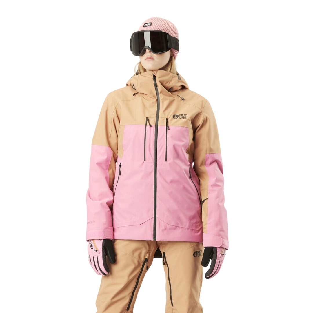 MANTEAU DE SKI PICTURE EXA POUR FEMME couleur CASHMERE ROSE vu du manteau rose pale et beige porté par une femme vue de la tête aux cuisses de face