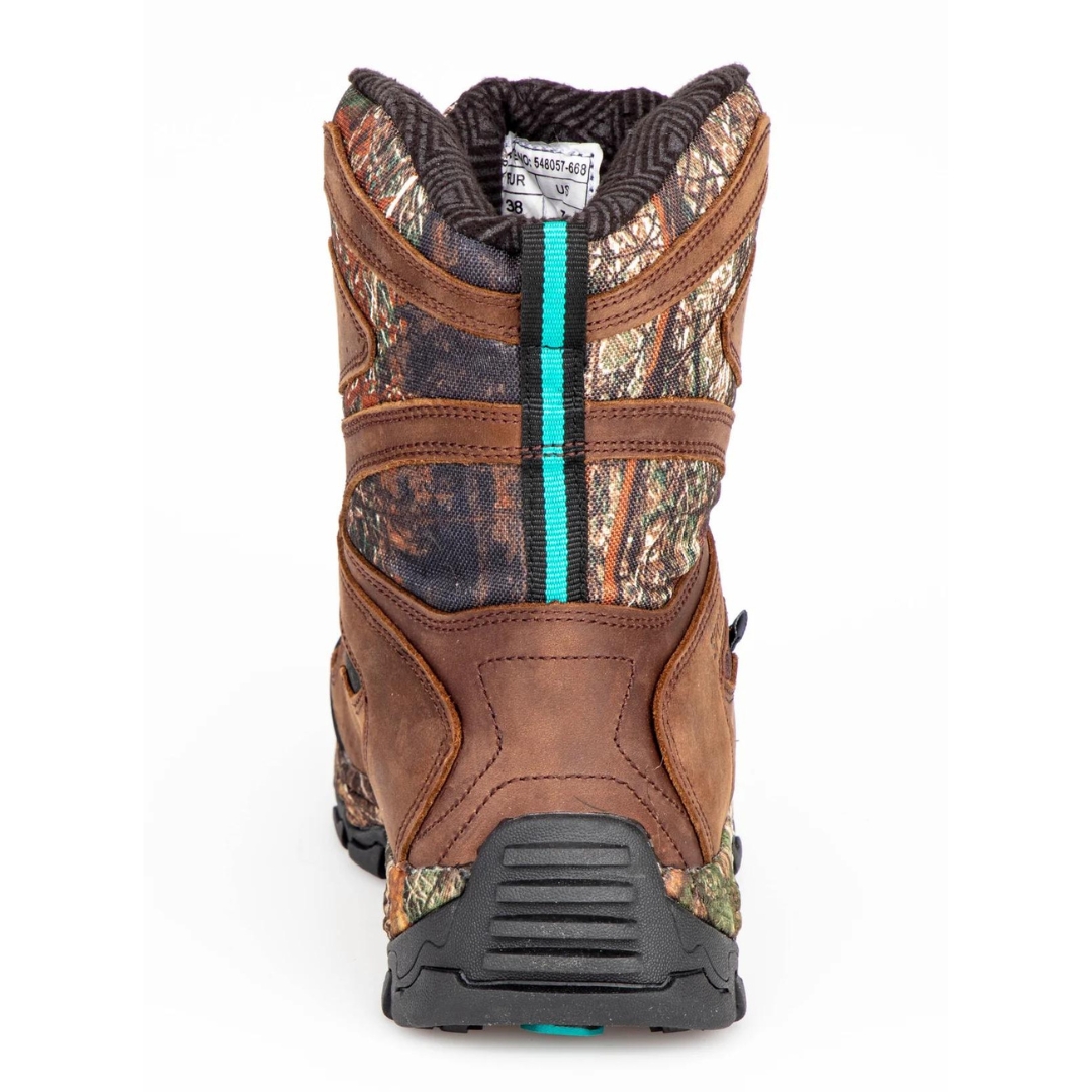 BOTTE DE CHASSE IMPERMÉABLE SPORTCHIEF ATHENA HIGH 1000 POUR FEMME COULEUR BRUN FONCÉ VUE DE LA BOTTE BRUNE, IMPRIMÉE CAMOUFFLAGE ET BLEU AQUA DE DOS