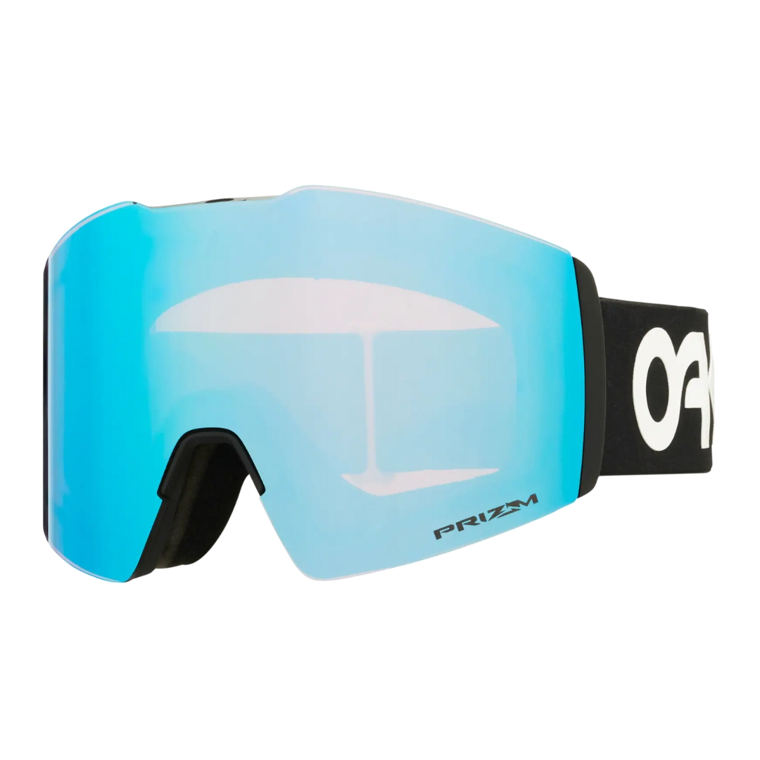 LUNETTE DE SKI ALPIN OAKLEY FALL LINE m POUR ADULTE COULEUR FACTORY PILOT BLACK / PRIZM SNOW SAPPHIRE IRIDIUM VU DE LA LUNETTE AVEC BANDE ÉLASTIQUE NOIRE LETTRÉE BLANCHE ET LENTILLE DÉGRADÉE EN BLEU DE PROFIL AVANT GAUCHE