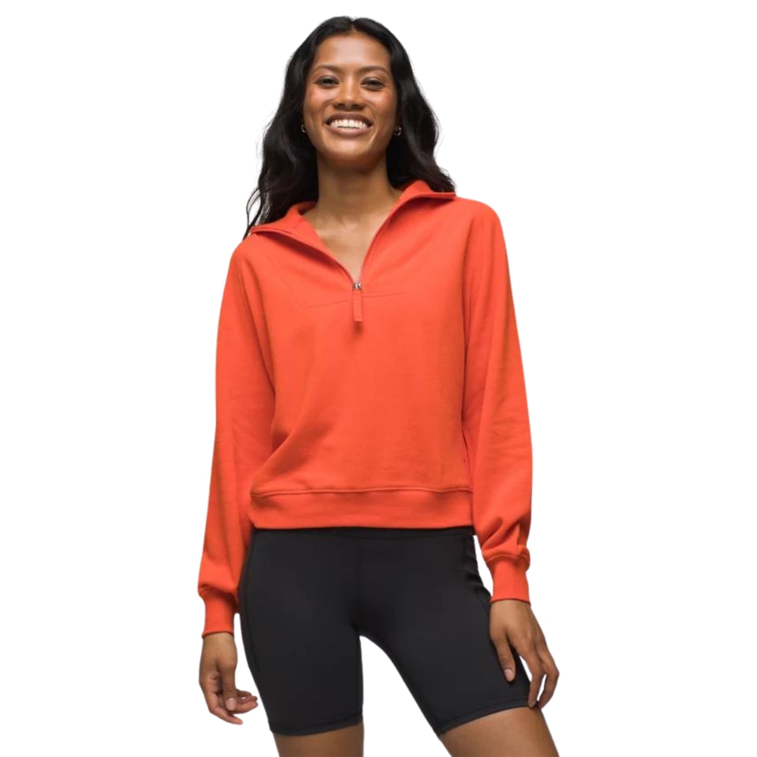 CHANDAIL À MANCHES LONGUES PRANA COZY UP PULLOVER POUR FEMME couleur FIRESIDE vue du chandail orange porté par une femme vue de face