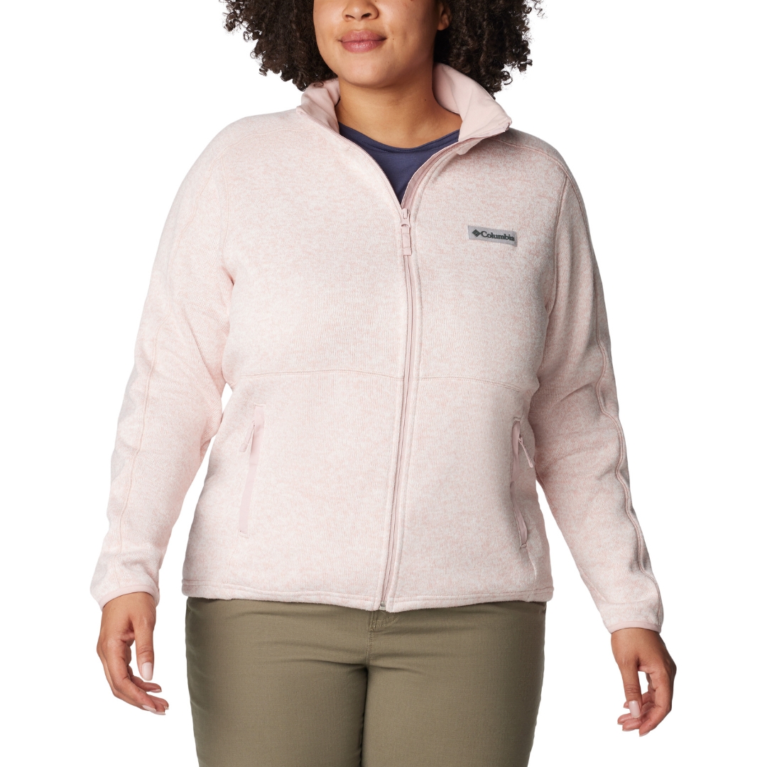 MANTEAU À FERMETURE ÉCLAIR PLEINE LONGUEUR COLUMBIA SWEATER WEATHER POUR FEMME COULEUR 626-DUSTY PINK HEATHER VU DU MANTEAU ROSE PALE CHINÉ PORTÉ PAR UNE FEMME VUE DE LA TÊTE AUX CUISSES DE FACE