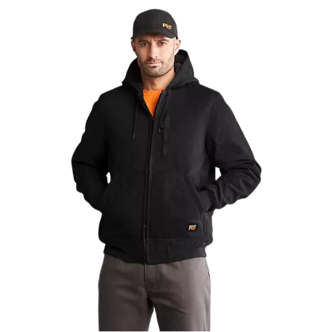 veste en toile à capuchon timberland Pro gritman pour homme couleur black vu de la veste noire portée par un homme vu de la tête aux cuisses de face