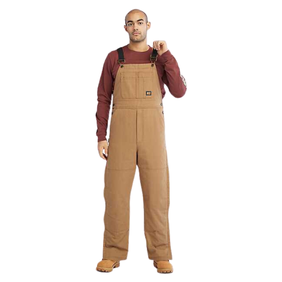 salopette isolée timberland gritman pour homme couleur dark wheat vu de la salopette brune/beige portée par un homme vu de face de la tête aux pieds