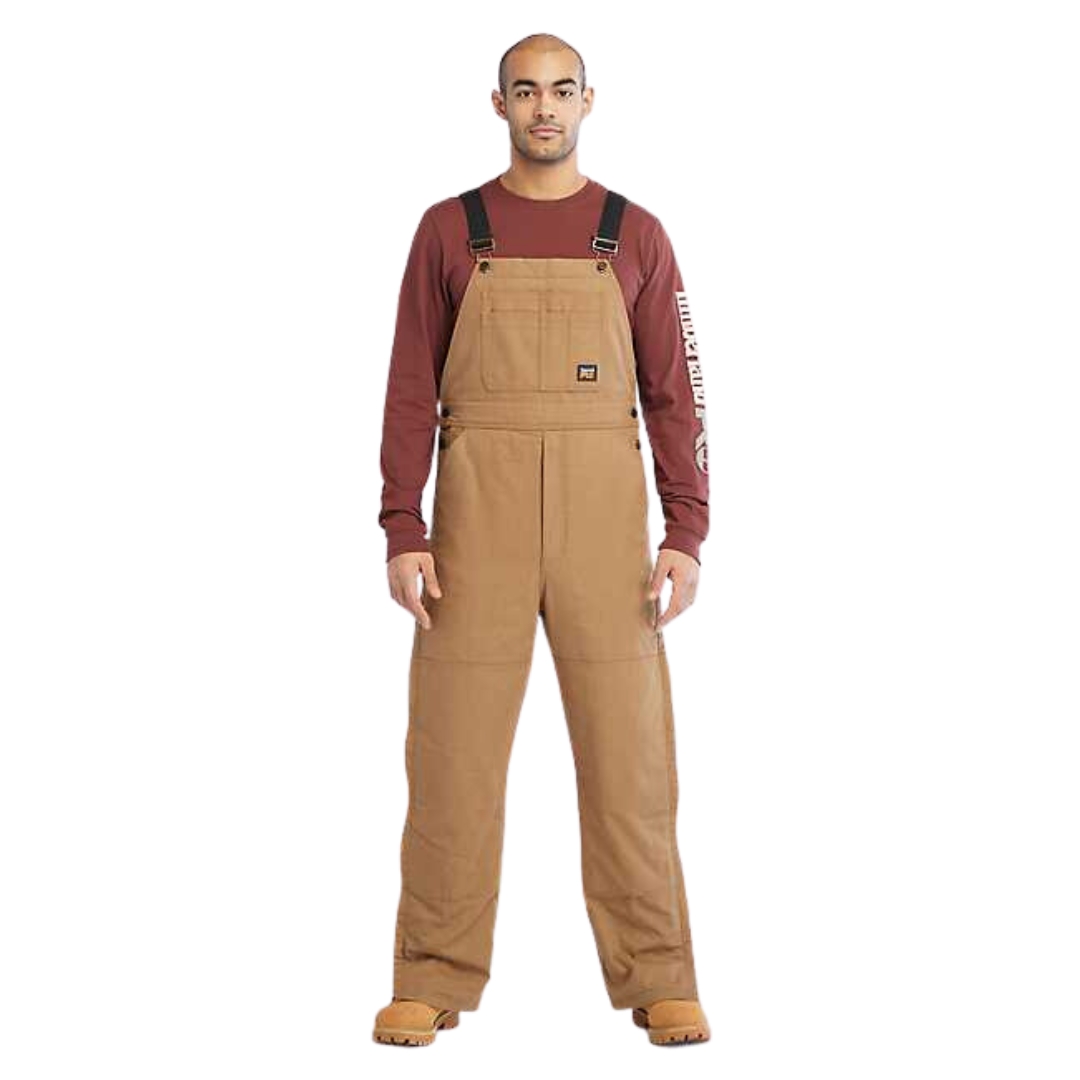salopette isolée timberland gritman pour homme couleur dark wheat vu de la salopette brune/beige portée par un homme vu de face de la tête aux pieds