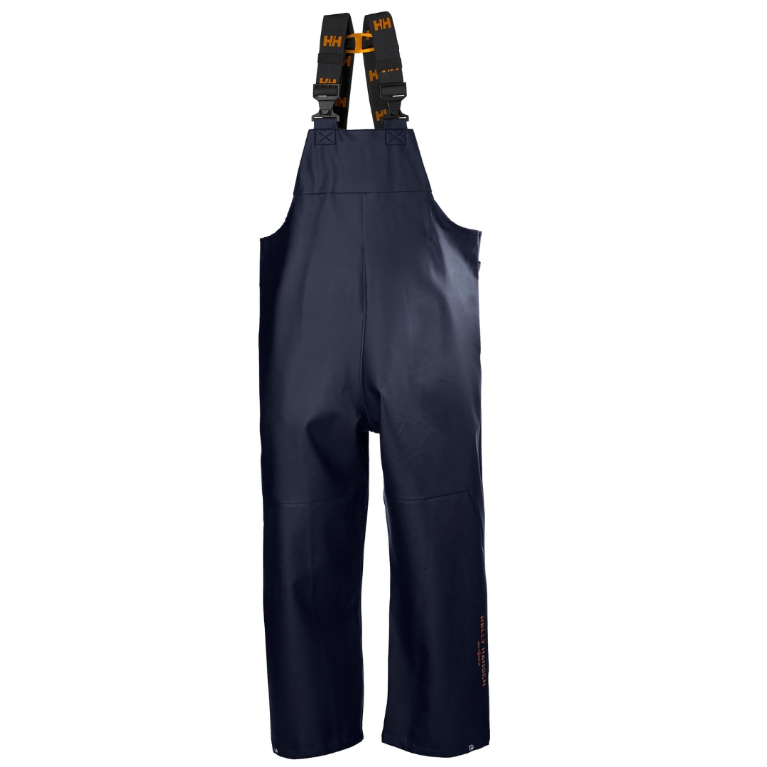 SALOPETTE DE TRAVAIL IMPERMÉABLE HELLY HANSEN WORKWEAR GALE POUR HOMME couleur navy bretelle élastique ajustale identifiées avec le logo HH en orange sur l a bretelle noire du pantalon marine