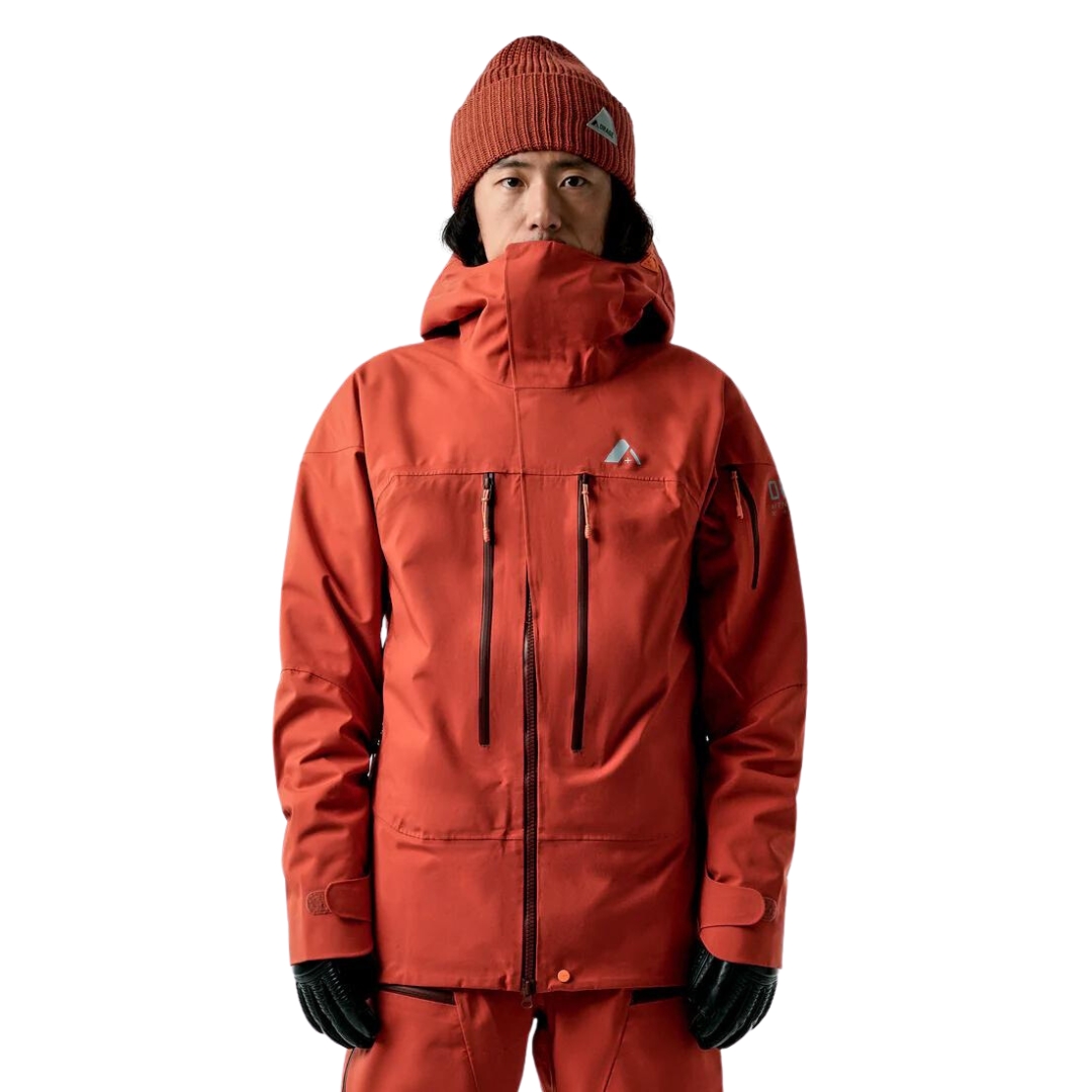 COQUILLE POUR LE SKI ALPIN ORAGE MTN-X SPURR POUR HOMME couleur R265-TERRACOTTA vu du manteau orange brulé porté par un homme vu de la tête aux cuisses de face