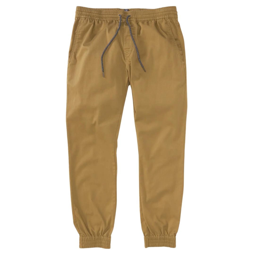 PANTALON JOGGER LONG VOLCOM FRICKIN SLIM POUR HOMME COULEUR DKA-DARK KHAKI VU DU PANTALON BEIGE KHAKI DE FACE