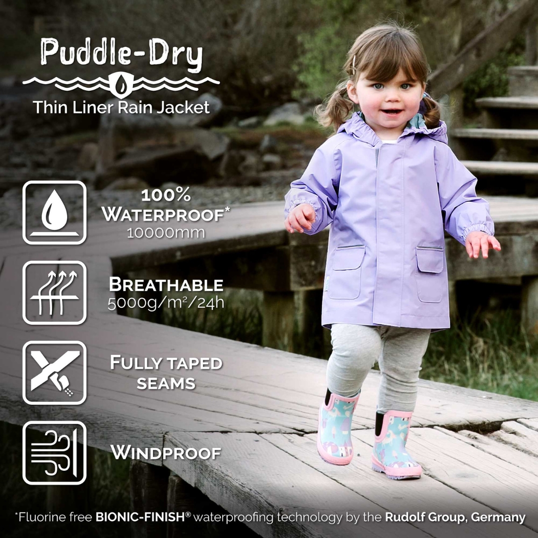 MANTEAU DE PLUIE JAN & JUL PUDDLE-DRY POUR ENFANT vu des caractéristiques des vêtements puddle-dry