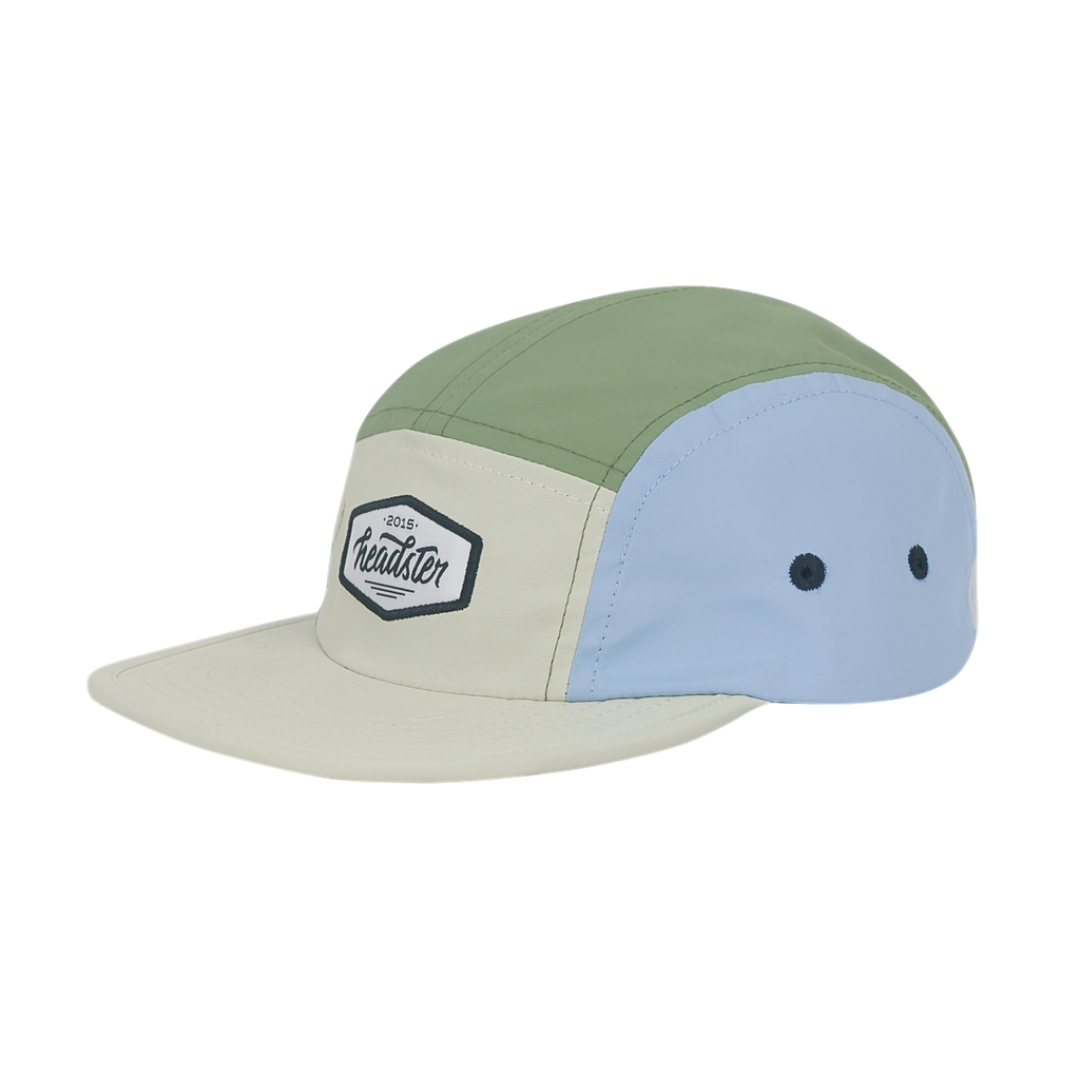 CASQUETTE À 5 PANNEAUX HEADSTER RUNNER POUR ENFANT ncouleur pale beige vu de la casquette beige, vert feuillage tendre et bleu ciel de profil avant gauche