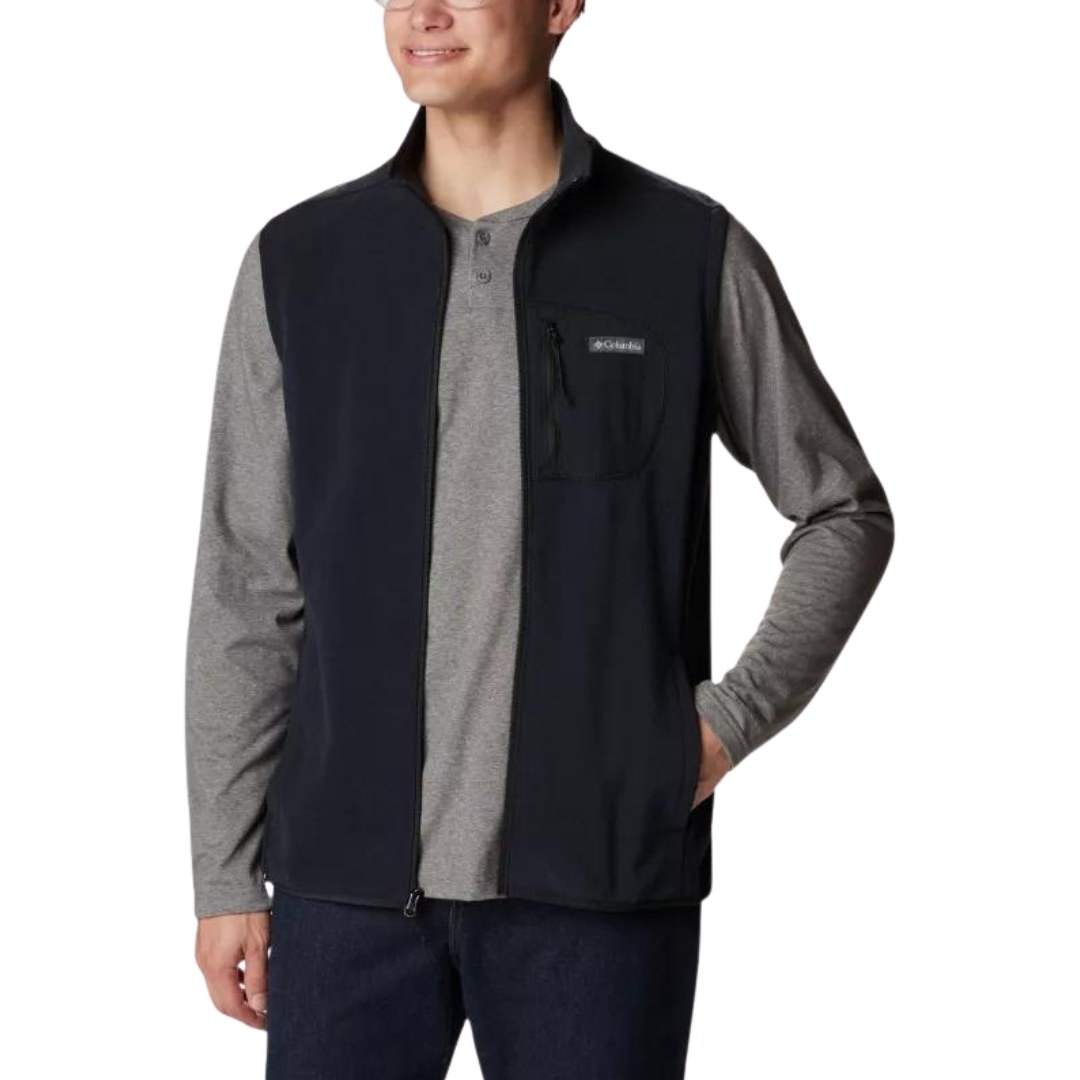 VESTE SANS MANCHES ISOLANTE COLUMBIA OUTDOOR TRACKS POUR HOMME couleur 010-black vu de la veste noire portée par un homme vu de la tête aux cuisses de face avec la veste ouverte