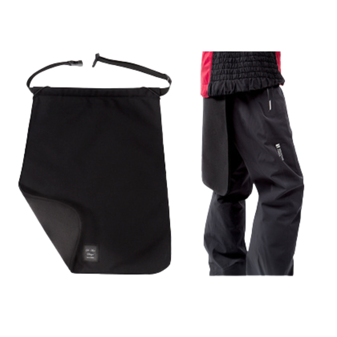 JUPE PARE-NEIGE DI-ANN DESIGN EN NYLON ET POLAR POUR LE SKI ALPIN couleur noir vu de la jupe noire de face et porté par un skieur vu de profil droit