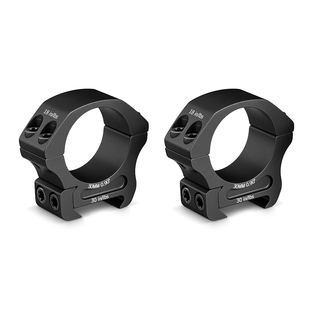 Deux anneaux de visée en métal noir avec vis de montage, chacun marqué avec des mesures et un texte sur l'angle d'inclinaison. Ils sont conçus pour fixer une lunette de visée sur un fusil ou un équipement similaire.